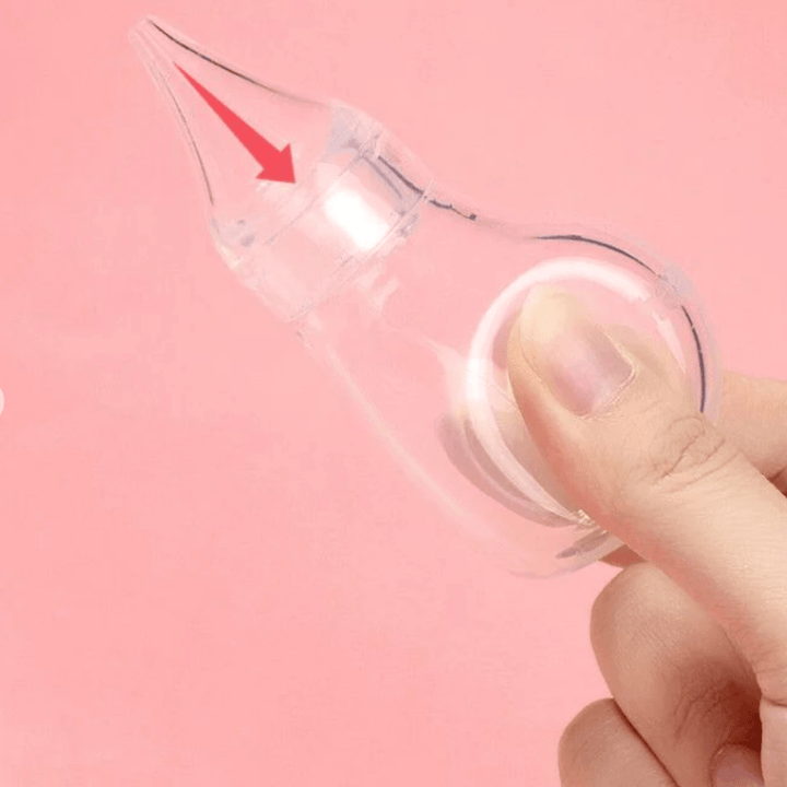 Close-up-of-Hand-Squeezing-Haakaa-Easy-Squeeze-Silicone-Bulb-Syringe-Naked-Baby-Eco-Boutique