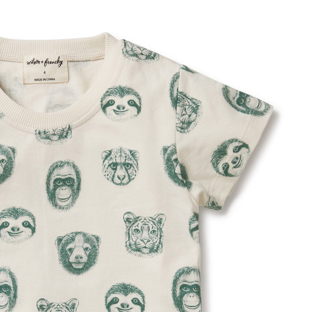 Children's sustainable fashion Wilson & Frenchy Organic Kids Tee with various animal faces print.