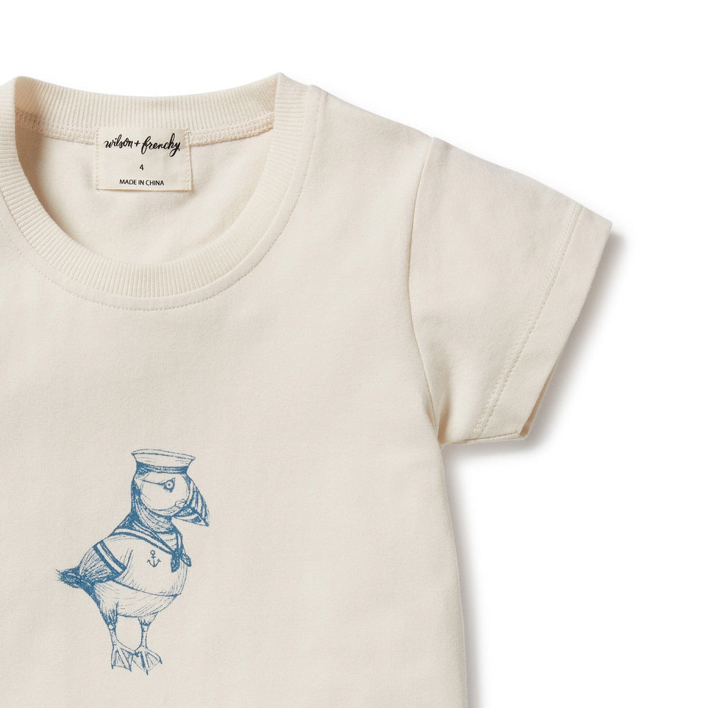 Wilson & Frenchy Puffin Organic Kids Tee featuring a printed illustration of a bird dressed as a sailor.