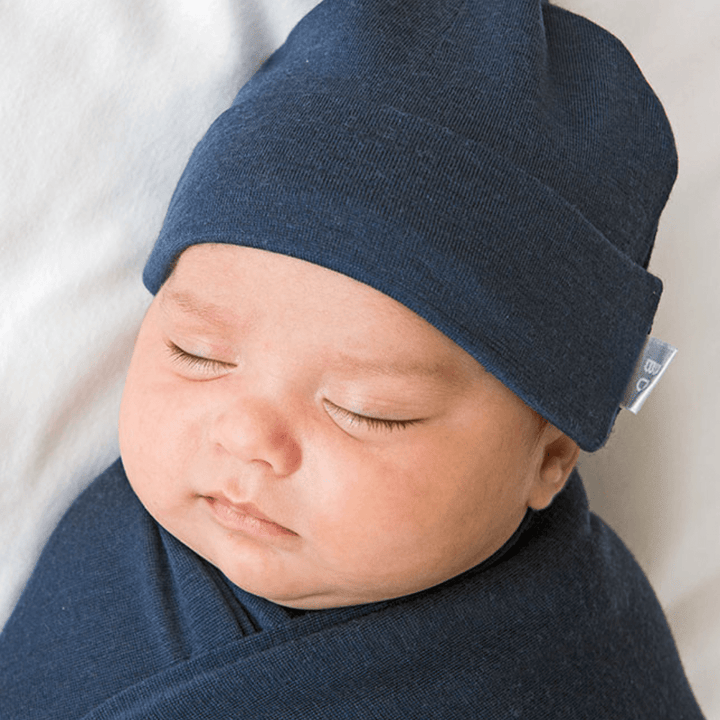 Close-up-of-Top-of-Baby-Wrapped-in-Babu-Merino-Swaddle-Wrap-Babu-Denim-Naked-Baby-Eco-Boutique