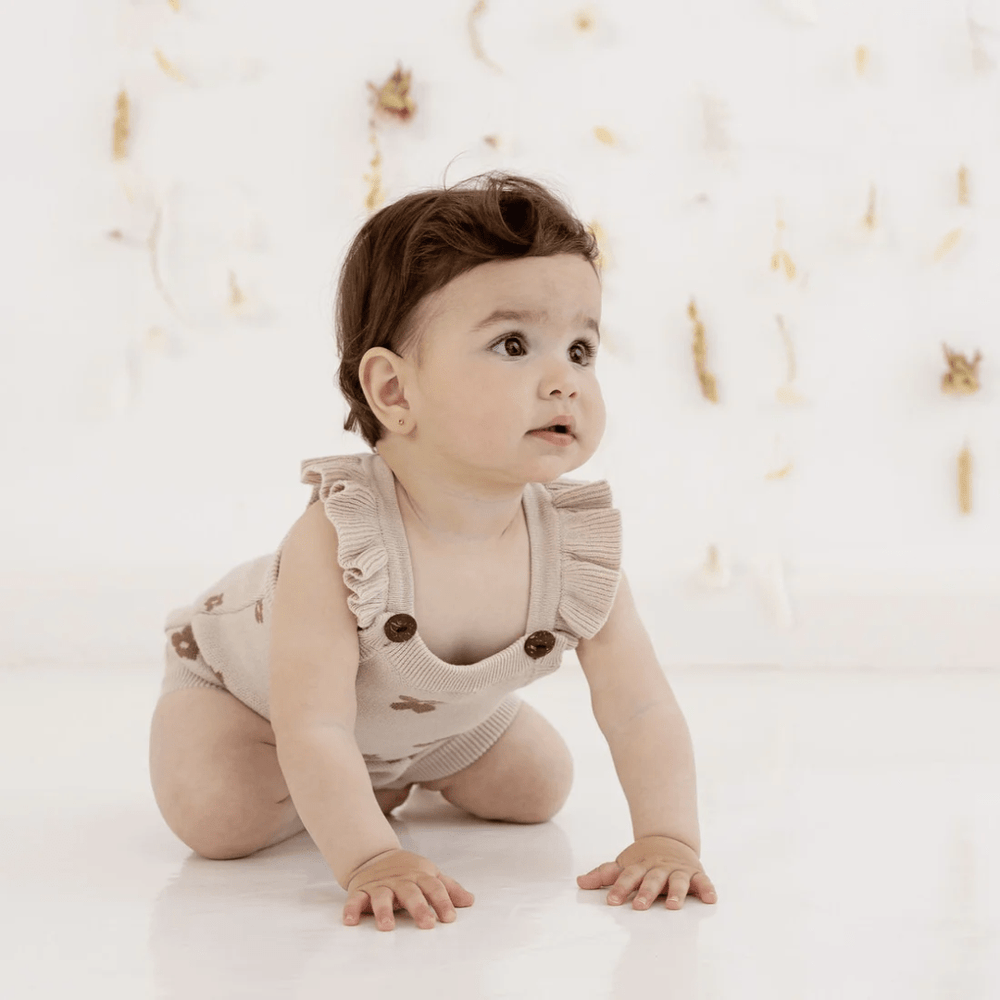 Crawling-Baby-Wearing-Aster-And-Oak-Organic-Cotton-Flower-Ruffle-Knit-Romper-Naked-Baby-Eco-Boutique