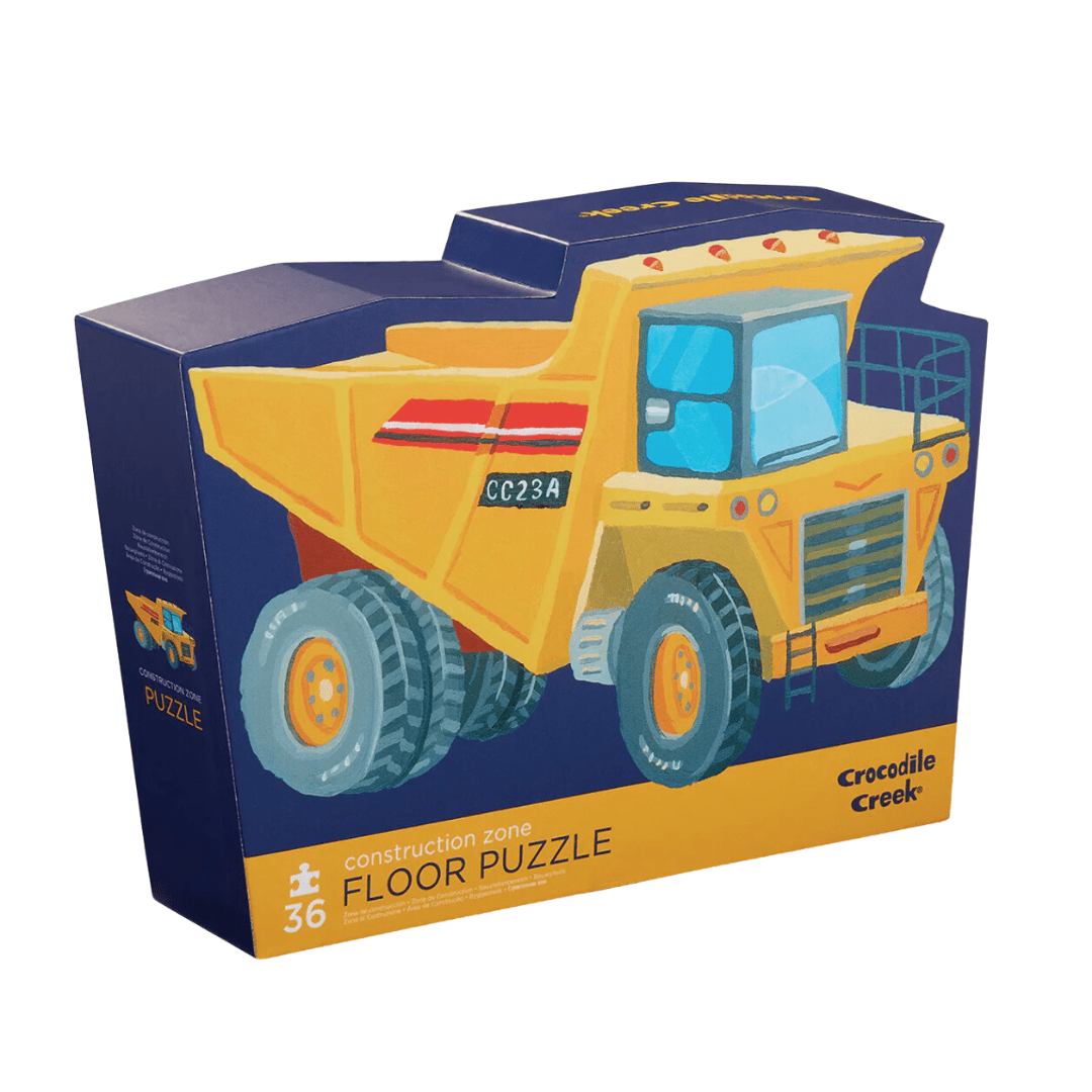 A Crocodile Creek 36-Piece Floor Puzzle featuring a yellow dump truck.
