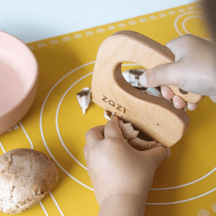 Cutting-Mushroom-With-Zazi-Wooden-Knife-Naked-Baby-Eco-Boutique