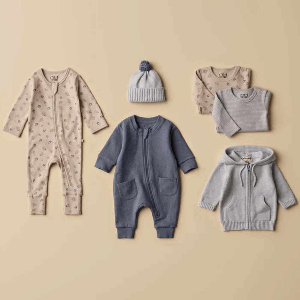 Flatlay-Of-Wilson-And-Frenchy-Organic-Quilted-Growsuit-Naked-Baby-Eco-Boutique