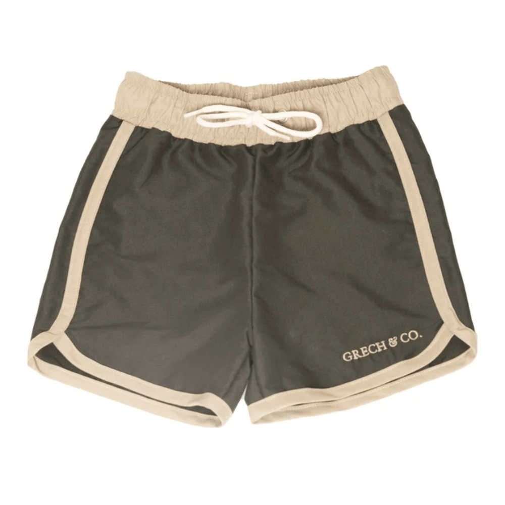 A Grech & Co. UPF 40+ recycled swim trunks with the word "green co" on it.