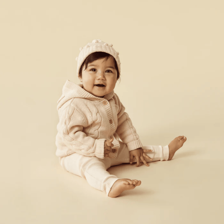 Happy-Baby-Smiling-Wearing-Wilson-And-Frenchy-Organic-Rib-Baby-Leggings-Pink-Naked-Baby-Eco-Boutique