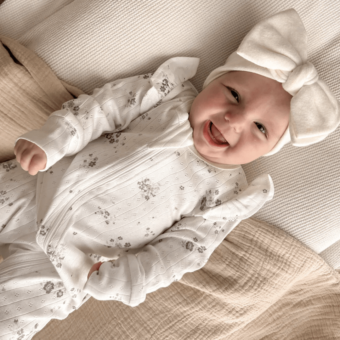 Happy-Baby-Wearing-Aster-And-Oak-Organic-Grace-Floral-Long-Sleeve-Zip-Romper-Naked-Baby-Eco-Boutique