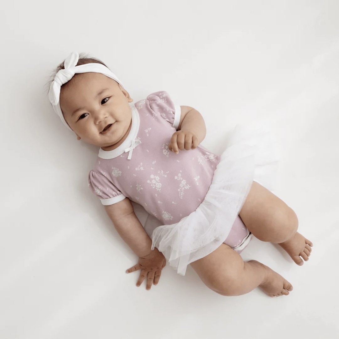 Happy-Baby-Wearing-Aster-And-Oak-Organic-Willow-Floral-Tutu-Onesie-Naked-Baby-Eco-Boutique