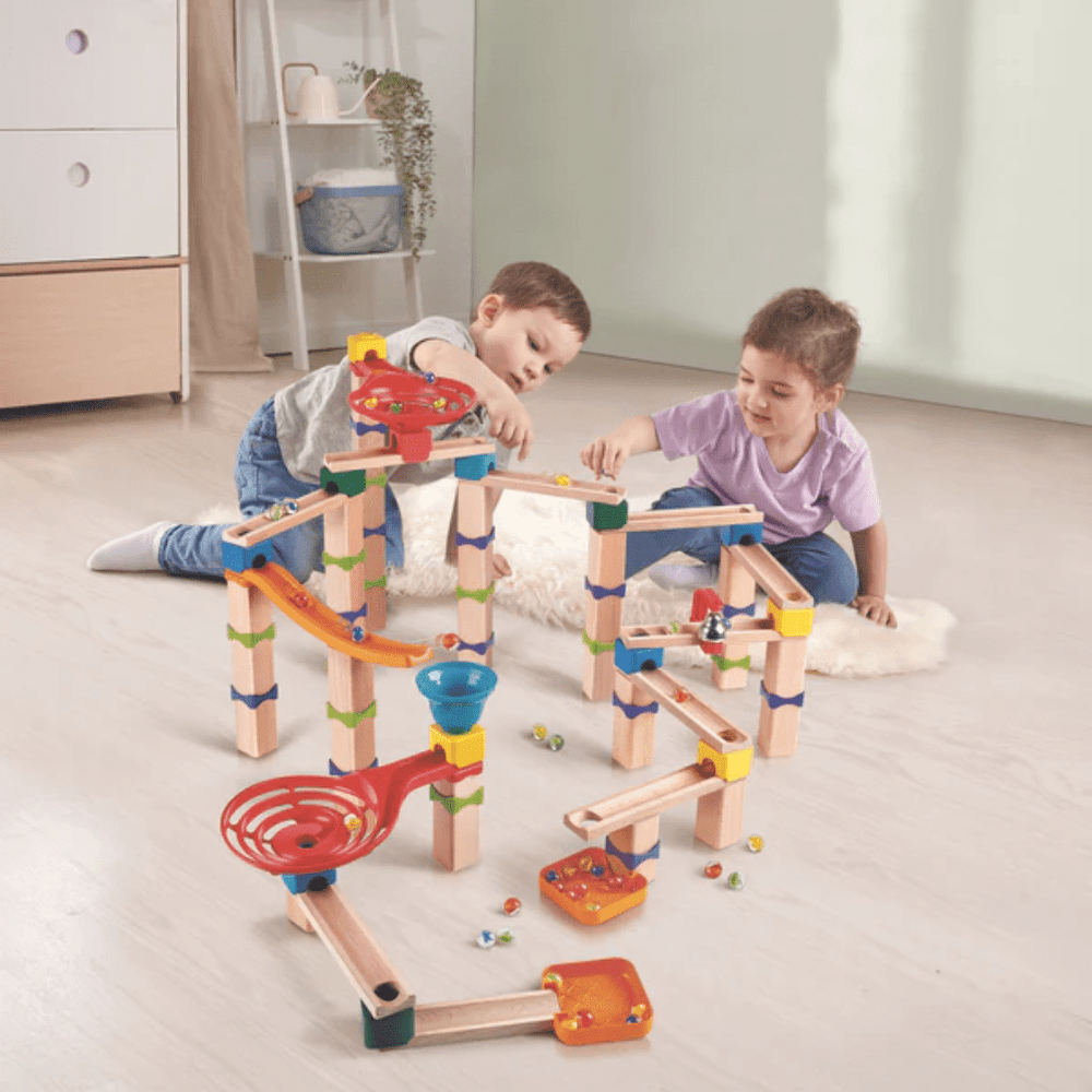 Happy-Kids-Playing-Together-With-Hape-Marble-Casscade-Block-Set-Naked-Baby-Eco-Boutique