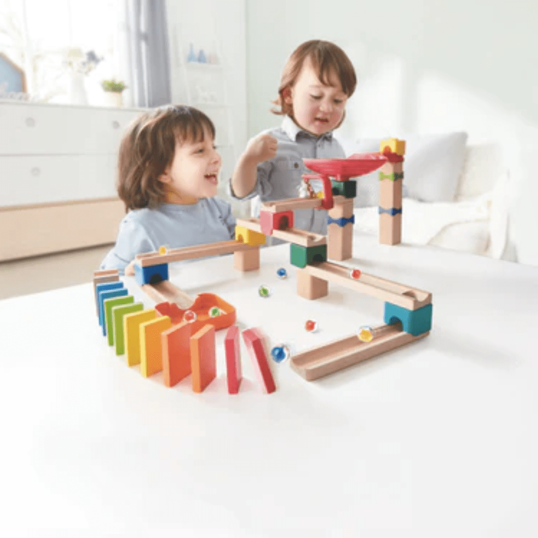 Happy-Kids-Playing-Together-With-Hape-Marble-Domino-Rally-Block-Set-Naked-Baby-Eco-Boutique