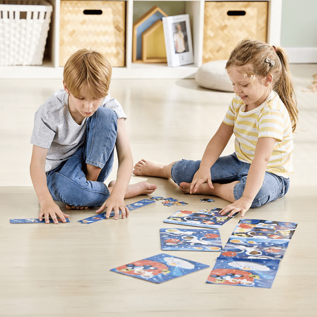 Kids-Putting-Puzlle-Together-Hape-3-In-1-Puzzle-And-Storytelling-Space-Adventure-Naked-Baby-Eco-Boutique