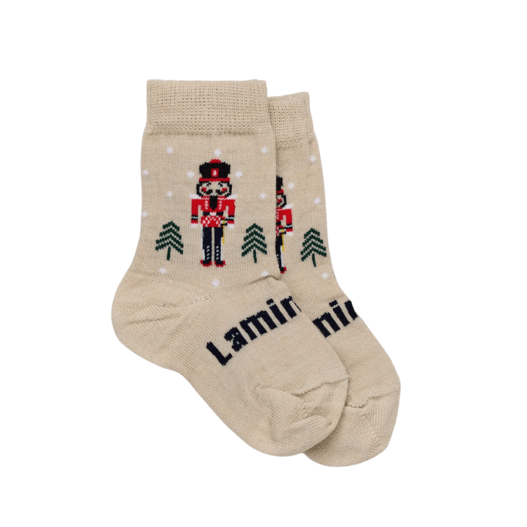 Product Description: These Lamington Merino Wool Christmas Socks - Crew - Nutcracker - LUCKY LASTS - 8-12 YEARS ONLY are a delightful addition to your wardrobe. Perfect for the holiday season, these socks feature a charming nutcracker design, adding a touch of festive cheer to any outfit.