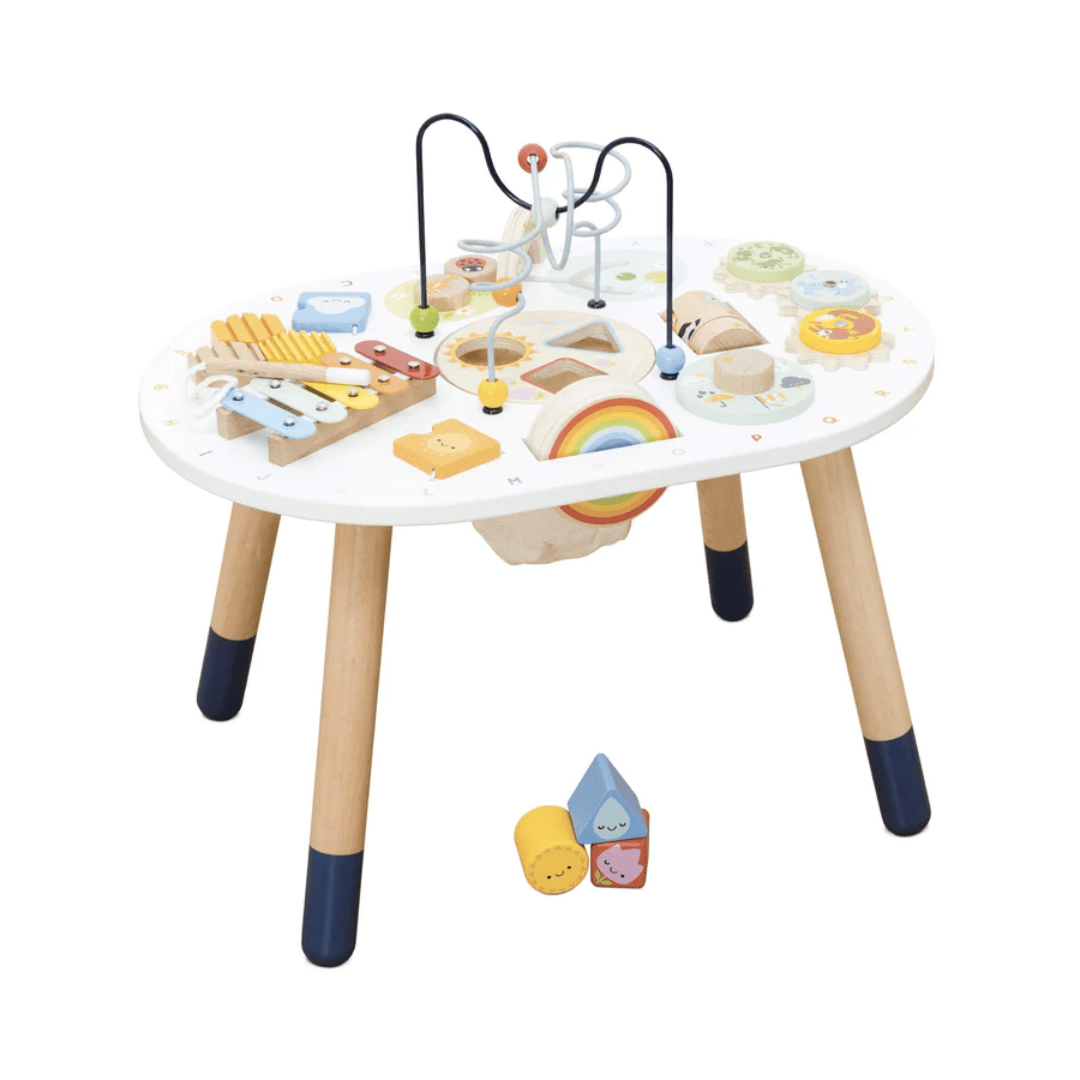 The Le Toy Van Activity Table is a Le Toy Van is an eco-friendly gift that offers a variety of sensory toys for toddlers.