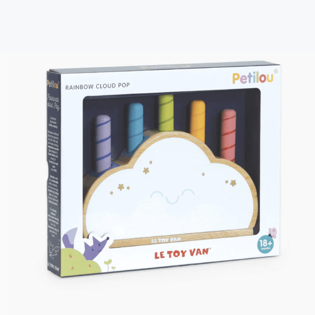 A Le Toy Van Rainbow Pop Cloud toy box with a hammering element for developing fine motor skills and color recognition.