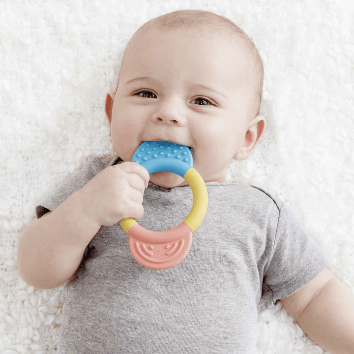 Little-Baby-Chewing-On-Hape-Teething-Ring-Naked-Baby-Eco-Boutique