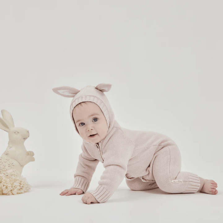 Little-Baby-Crawling-With-Toy-Bunny-Wearing-Aster-And-Oak-Organic-Bunny-Knit-Romper-Mauve-Naked-Baby-Eco-Boutique