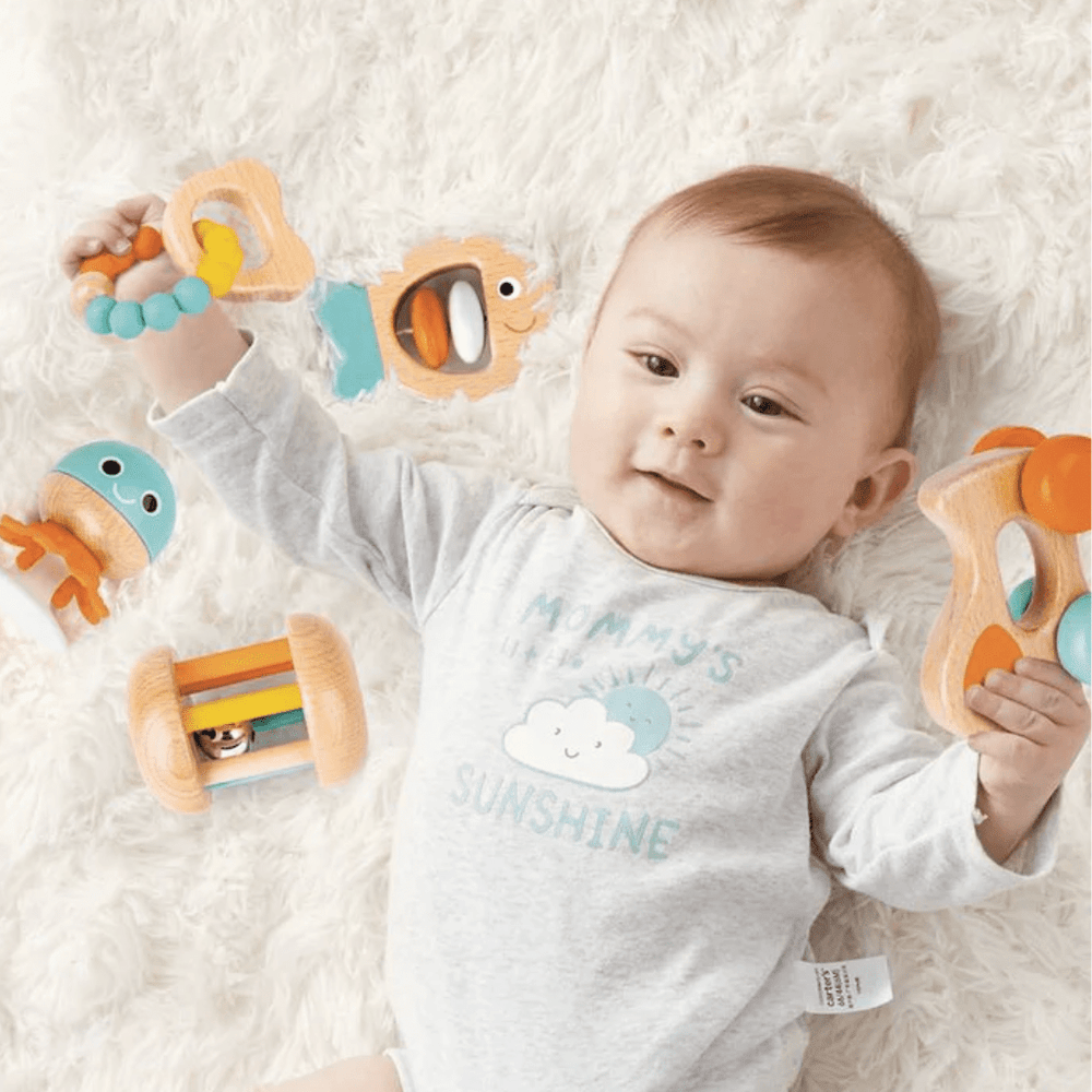 Little-Baby-Playing-With-Hape-Multi-Stage-Sensory-Gift-Set-Naked-Baby-Eco-Boutique