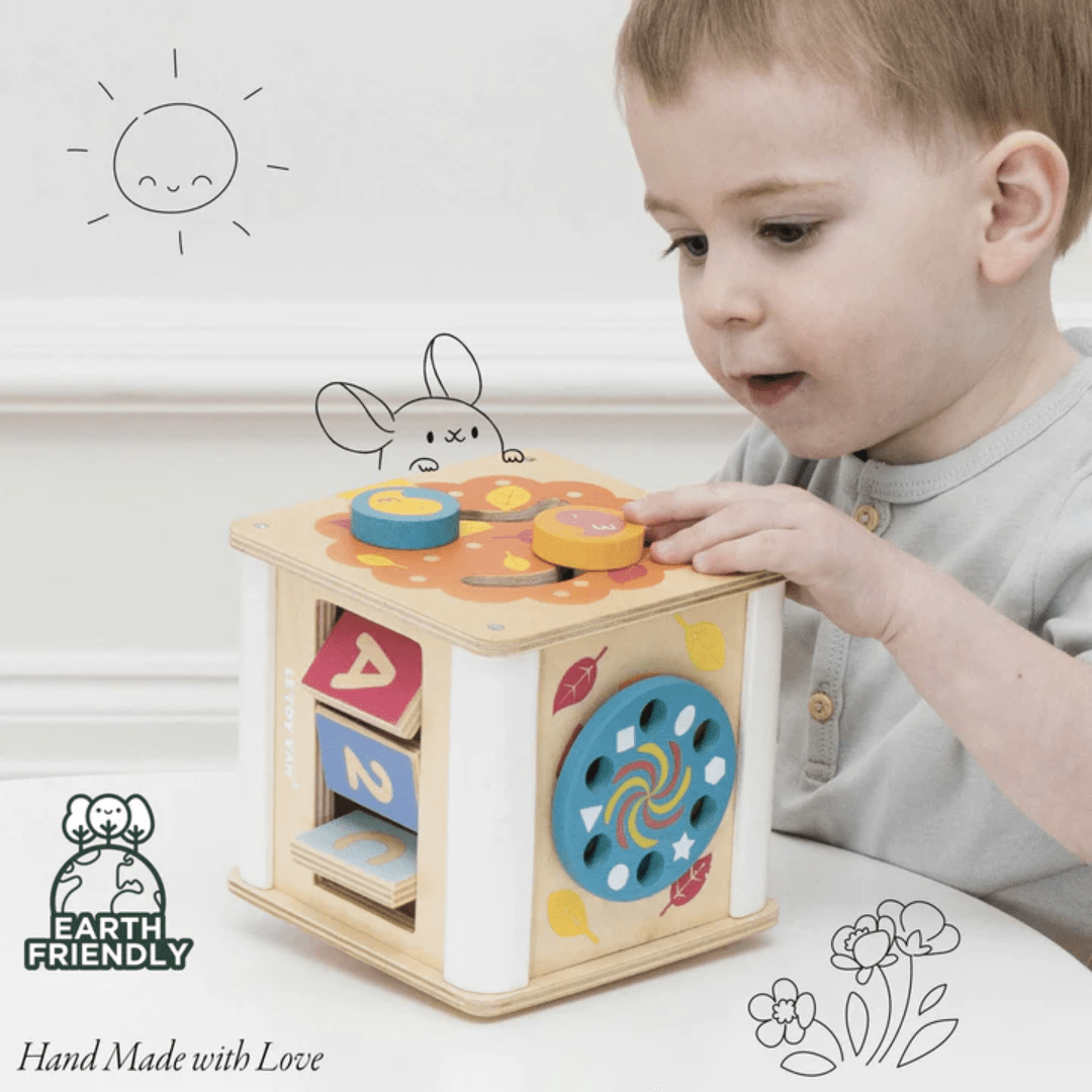 Little-Baby-Playing-With-Le-Toy-Van-Petit-Activity-Cube-Naked-Baby-Eco-Boutique