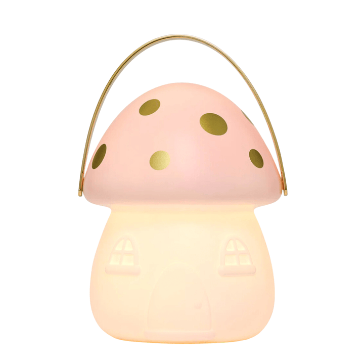 Little Belle Nightlights Mini Fairy House Carry Lantern with a soft glow, featuring a handle, door, and window designs.