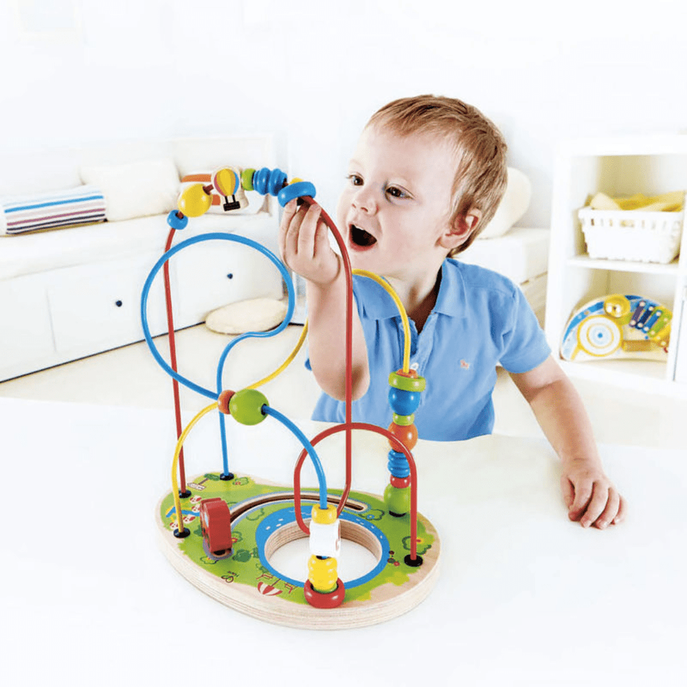 Little-Boy-Moving-Beads-On-Hape-Playground-Pizzaz-Naked-Baby-Eco-Boutique