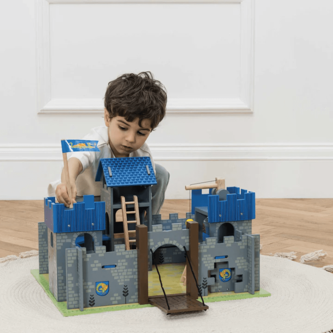Little-Boy-Playing-With-Le-Toy-Van-Excalibur-Castle-Naked-Baby-Eco-Boutique