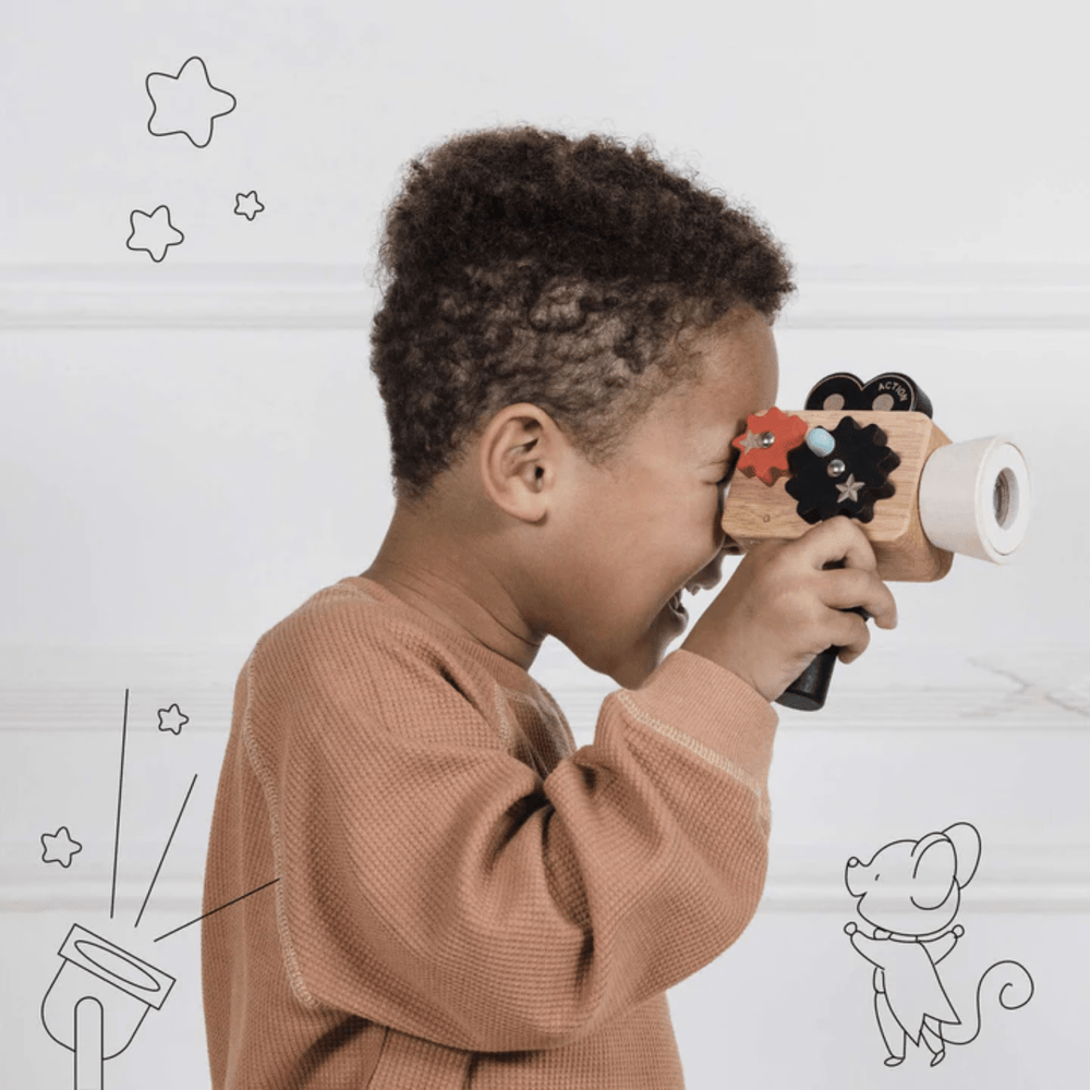 Little-Boy-Playing-With-Le-Toy-Van-Hollywood-Film-Camera-Naked-Baby-Eco-Boutique
