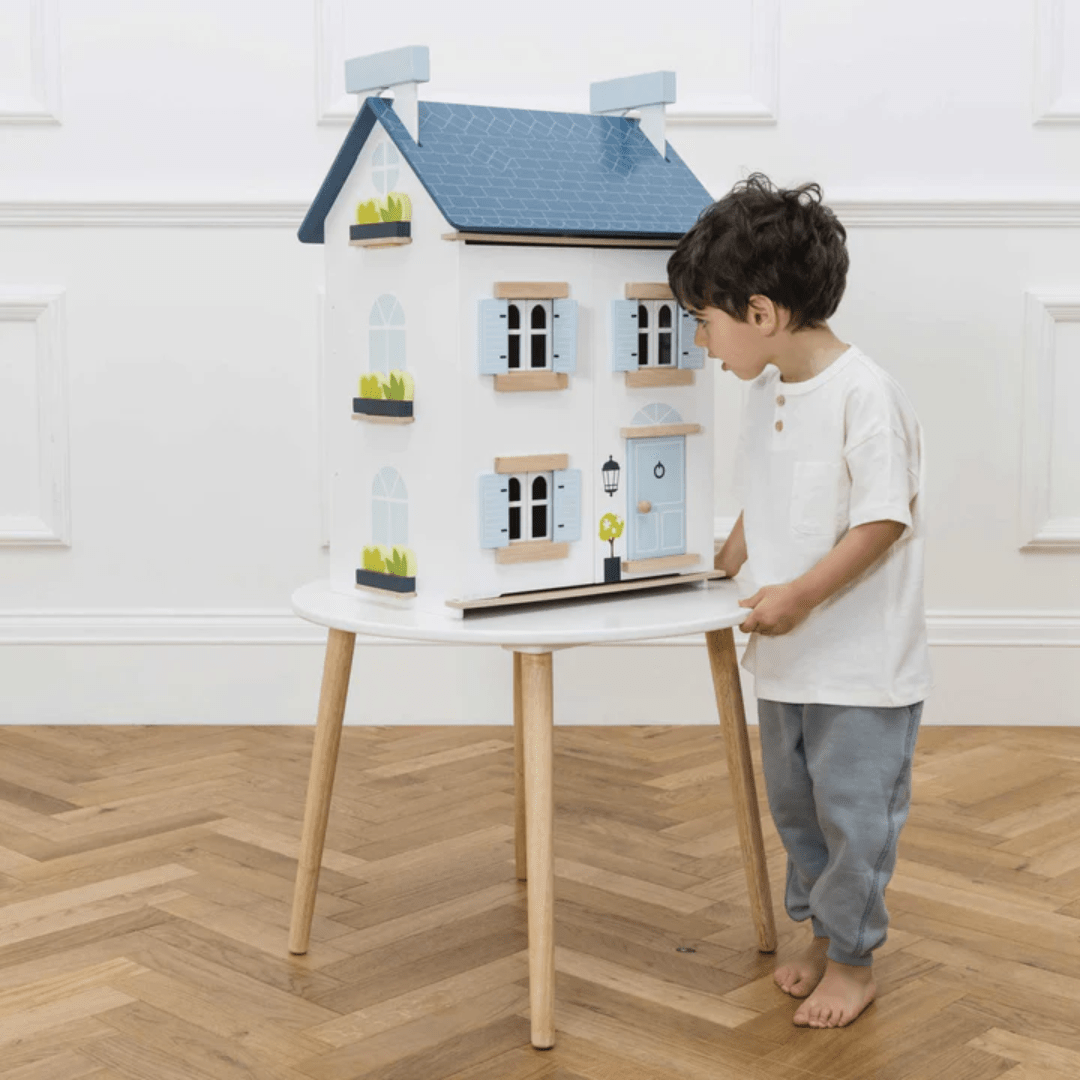 Little-Boy-Playing-With-Le-Toy-Van-Sky-Dollhouse-Naked-Baby-Eco-Boutique