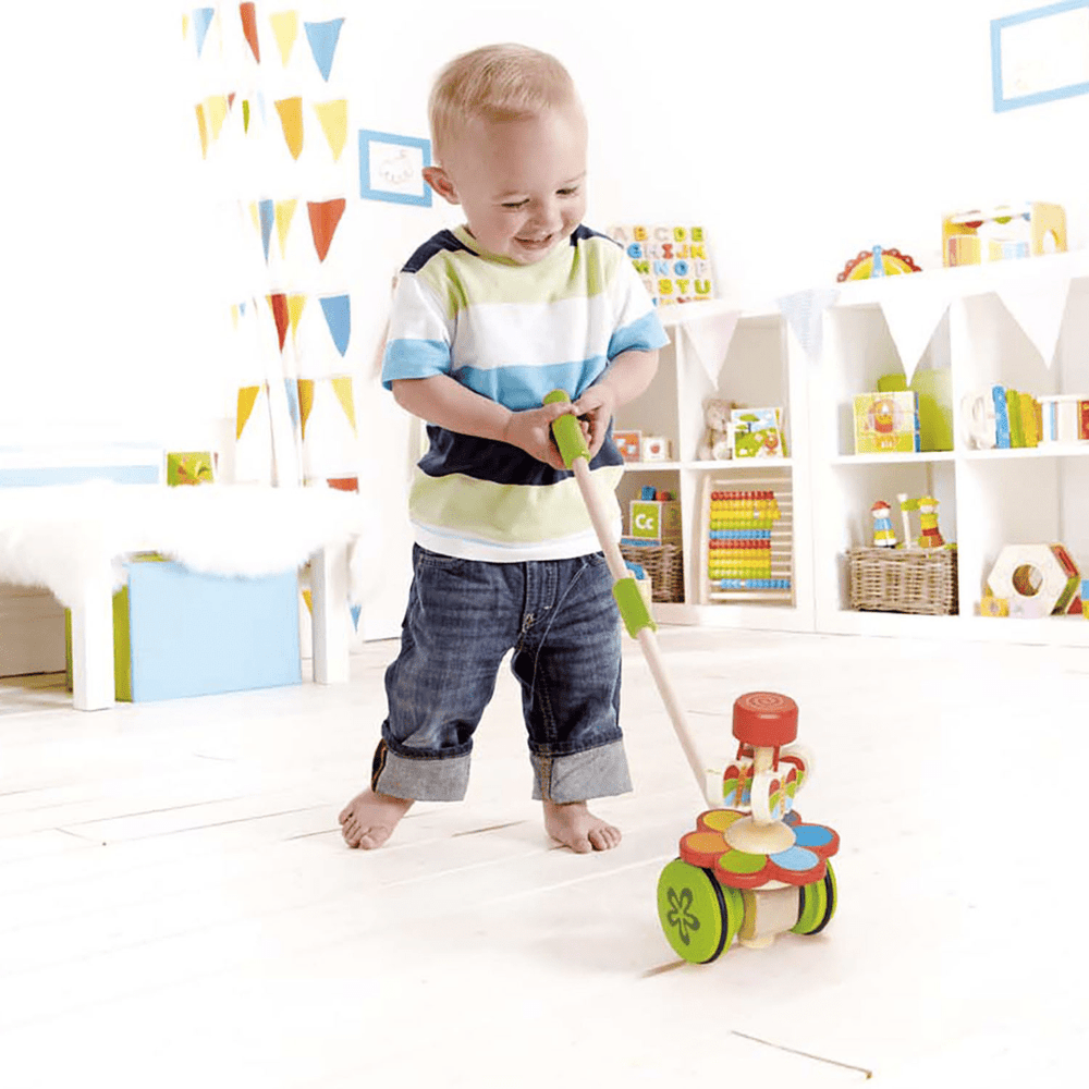 Little-Boy-Pushing-Hape-Dancing-Butterfly-Naked-Baby-Eco-Boutique