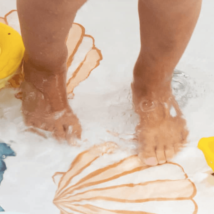 Little-Feet-In-Bath-With-Zazi-Slip-Safe-Bath-Spots-Sea-Shell-Naked-Baby-Eco-Boutique