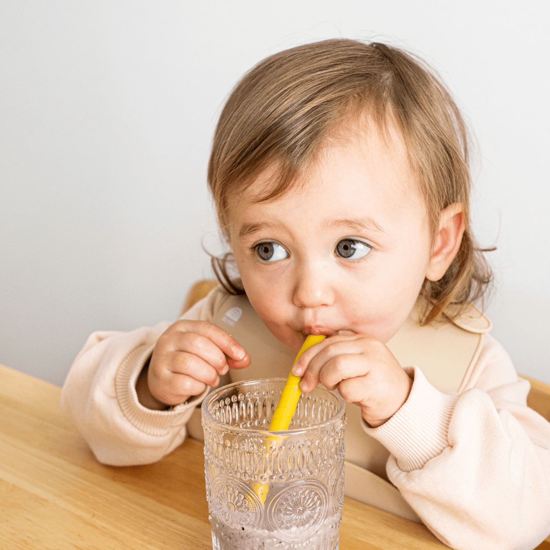 Little-Girl-Drinking-From-Zazi-Silicone-Mini-Straws-Naked-Baby-Eco-Boutique
