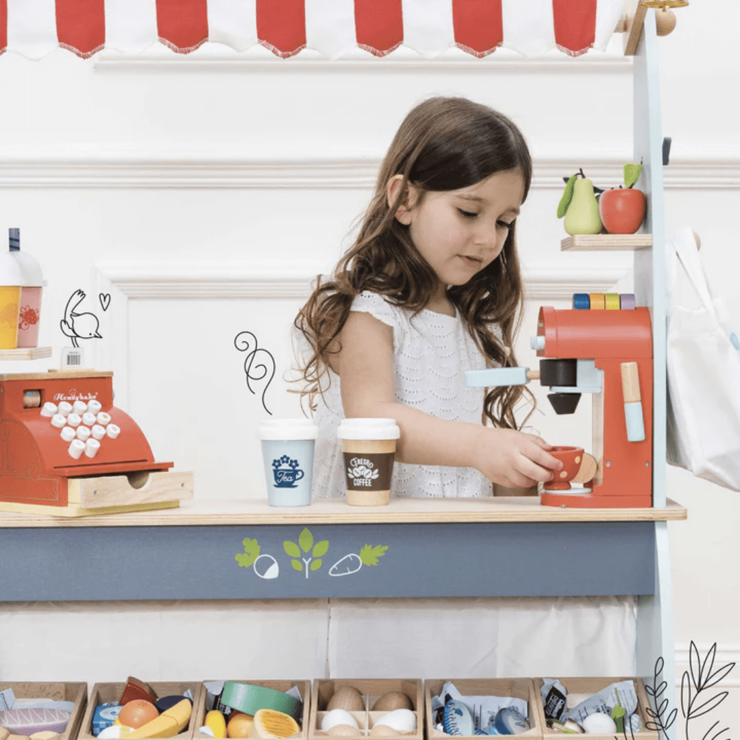 Little-Girl-Playing-With-Le-Toy-Van-Cafe-Machine-Naked-Baby-Eco-Boutique