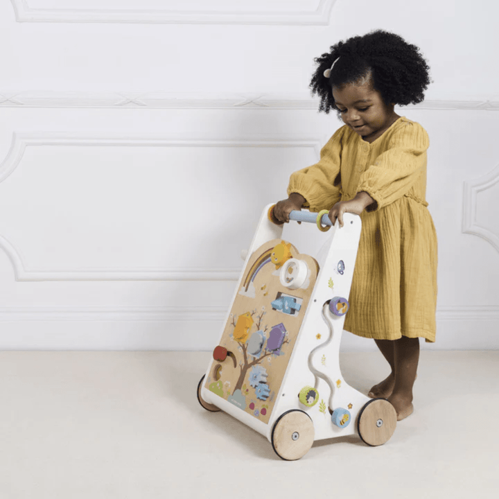 Little-Girl-Pushing-Le-Toy-Van-Activity-Walker-Naked-Baby-Eco-Boutique