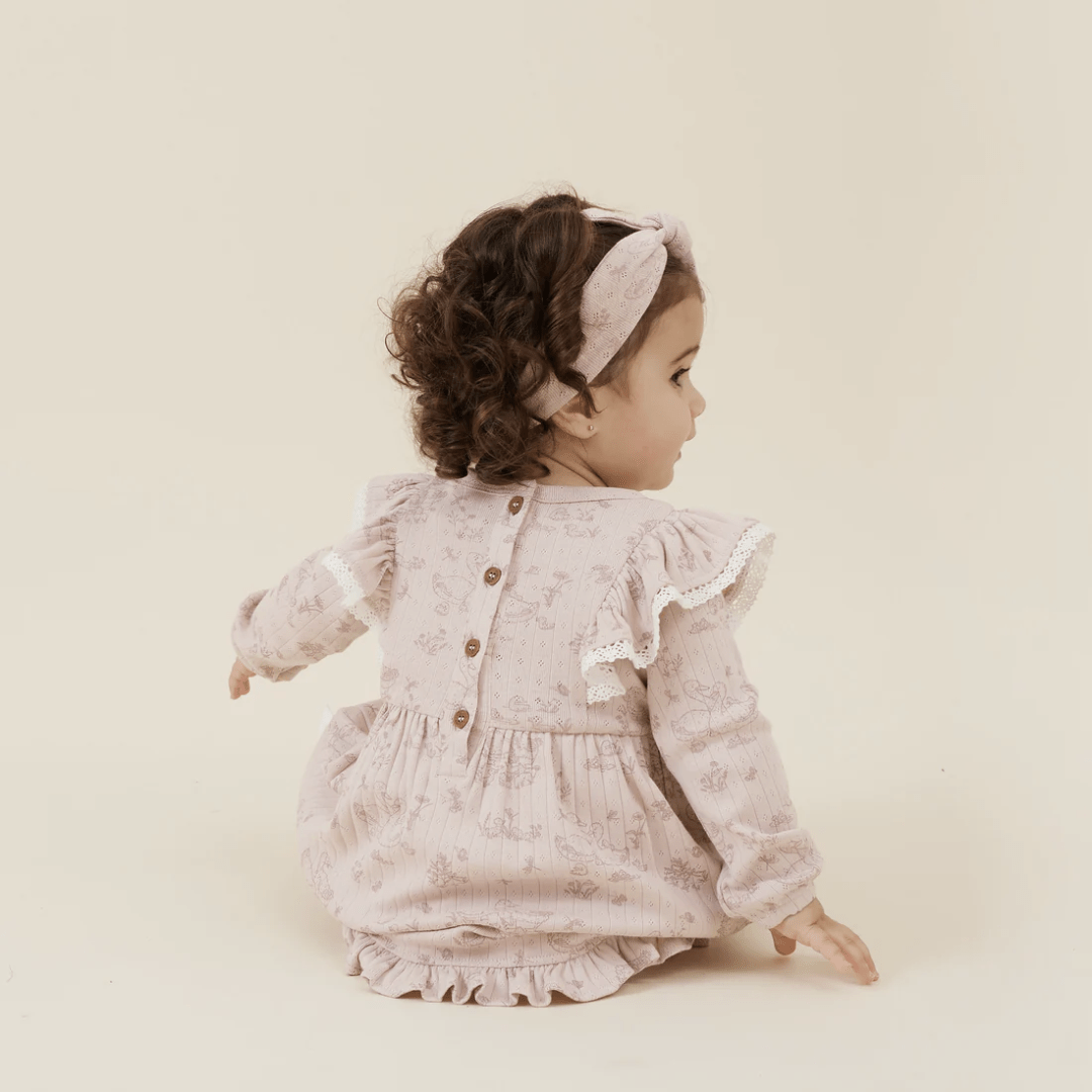 Little-Girl-Wearing-Aster-And-Oak-Organic-Duck-Family-Headband-With-Matcing-Dress-Naked-Baby-Eco-Boutique