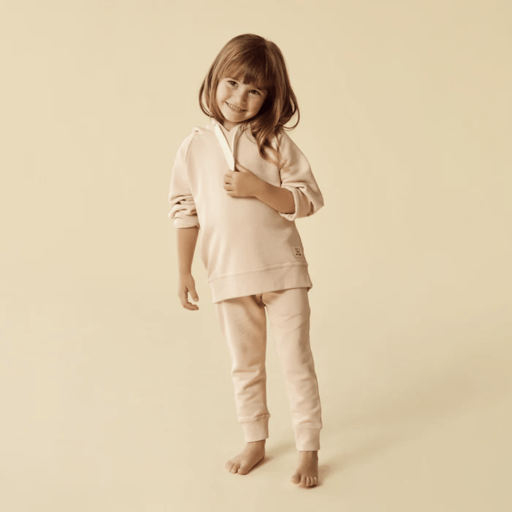 Little-Girl-Wearing-Matching-Top-With-Wilson-And-Frenchy-Organic-Terry-Sweat-Pants-Rose-Naked-Baby-Eco-Boutique