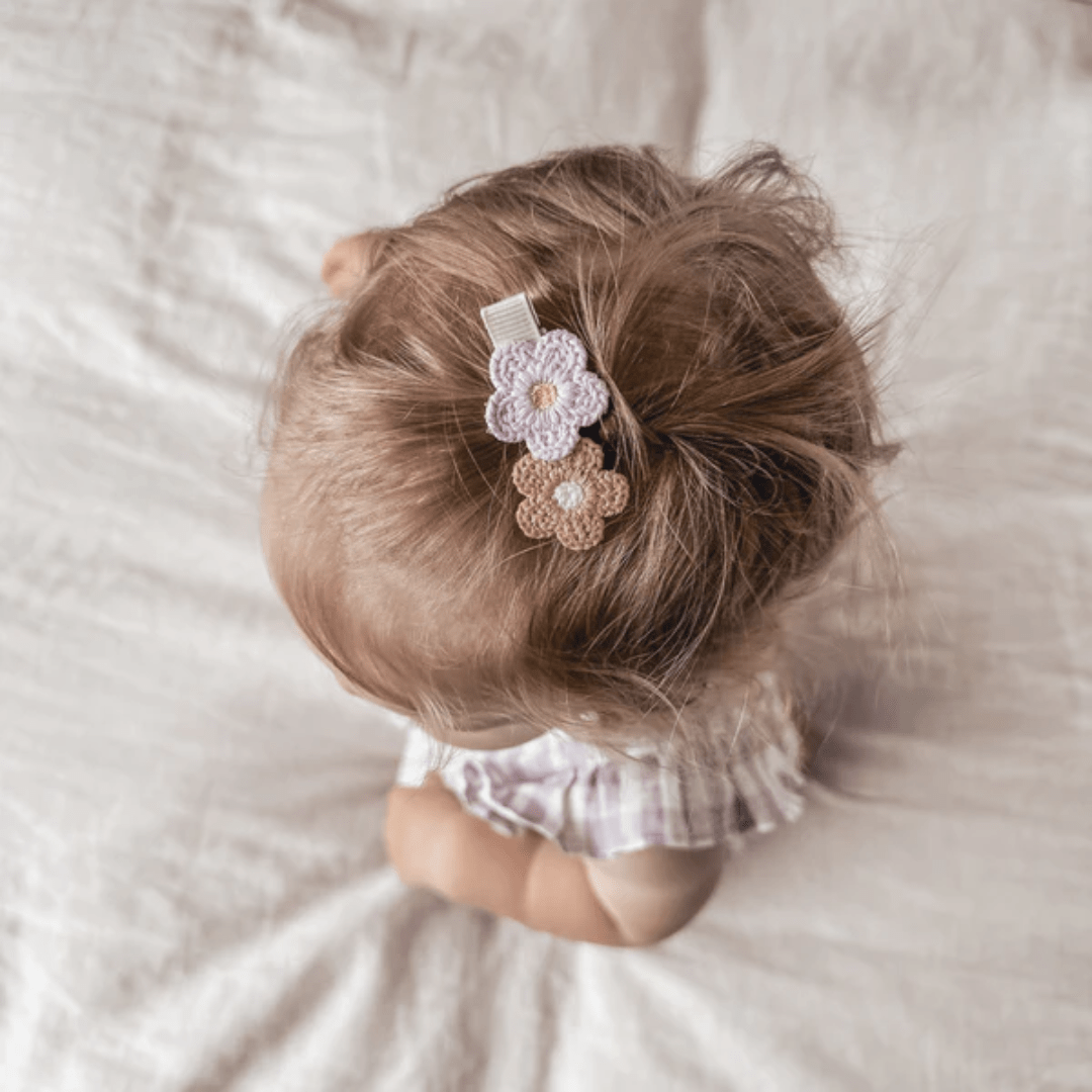 Little-Girl-Wearing-Ovr-The-Dandelions-Daisy-Hair-Clips-Naked-Baby-Eco-Boutique
