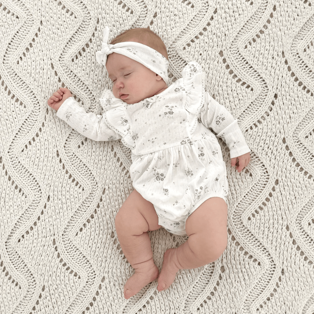 Little-Sleepy-Baby-Wearing-Aster-And-Oak-Organic-Grace-Floral-Bubble-Romper-Naked-Baby-Eco-Boutique