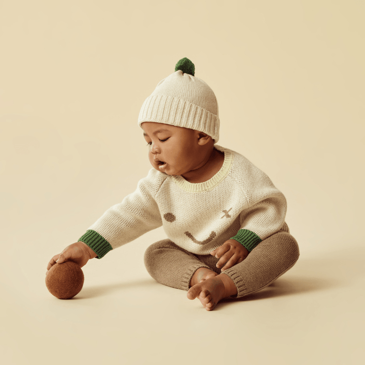 Lttle-Boy-Wearing-Wilson-And-Frenchy-Knitted-Jacquard-Jumper-Almond-Naked-Baby-Eco-Boutique