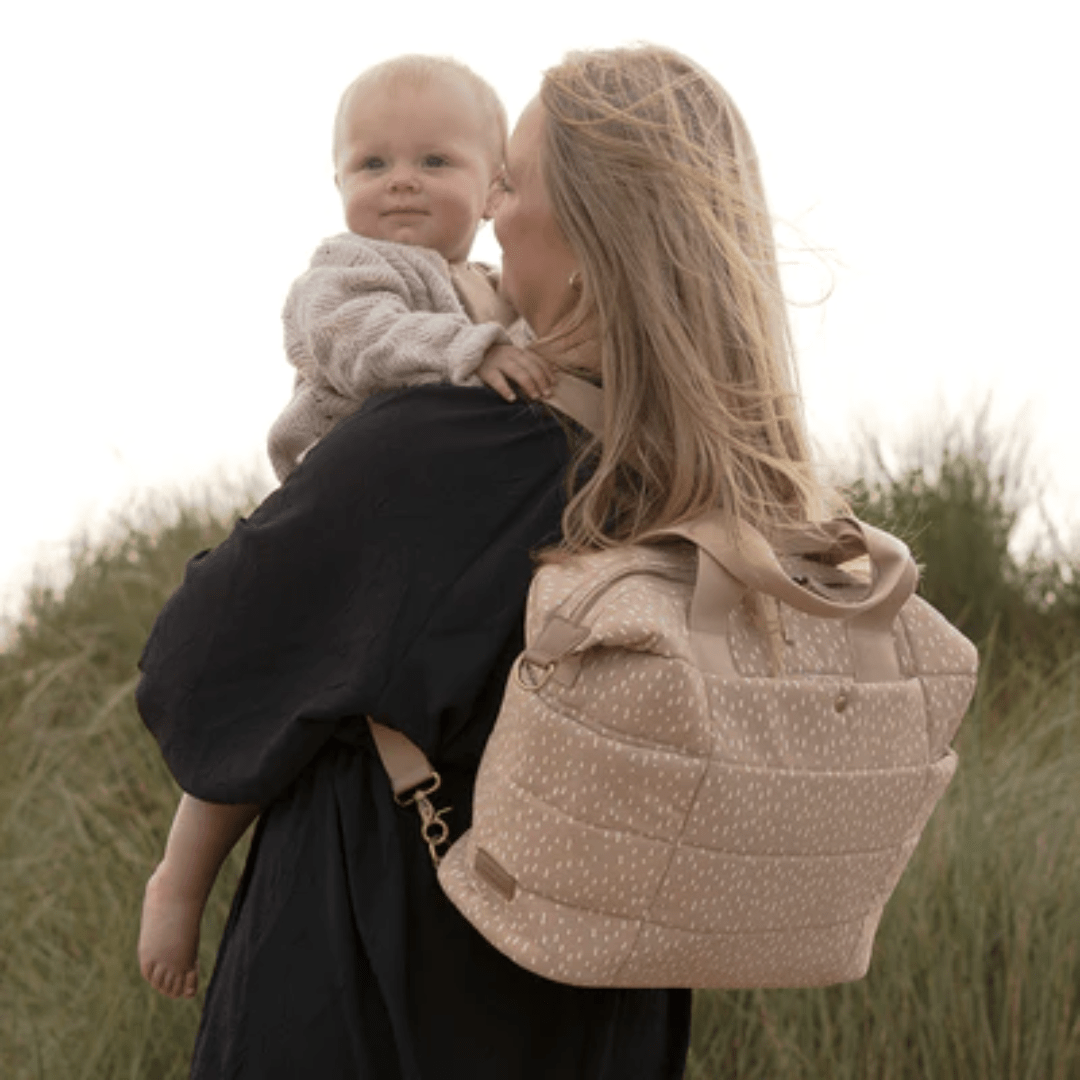 Mother-Wearing-Storksak-Organic-Tote-Seashell-Naked-Baby-Eco-Boutique