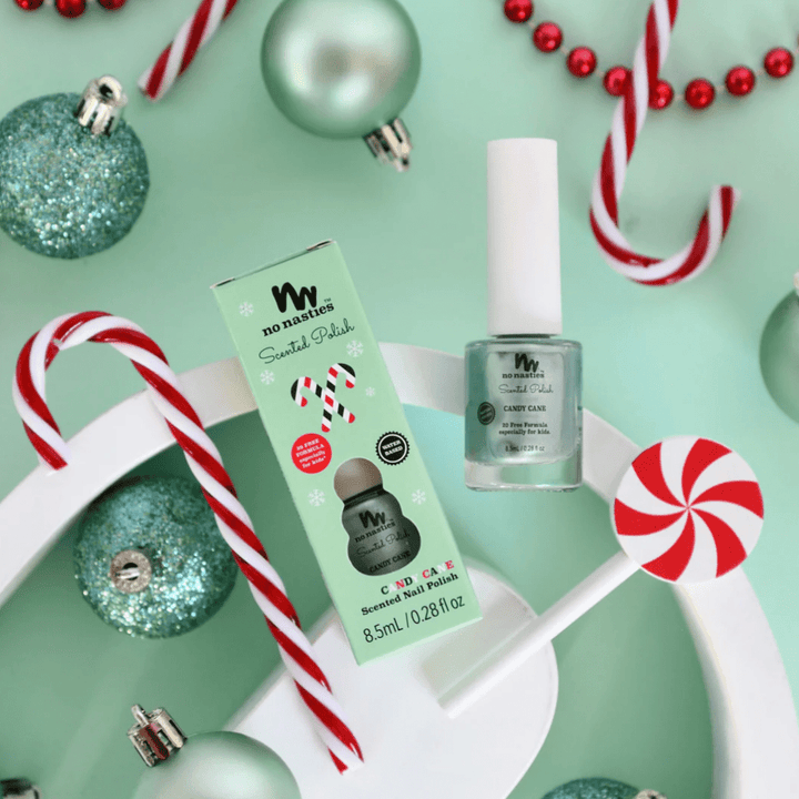 This No Nasties Limited Edition 20 FREE Kids Scented Christmas Nail Polish - LUCKY LAST - SHIMMERY GREEN (CANDY CANE) ONLY is an outlet item with non-toxic ingredients that will leave nails smelling fresh and looking stylish.