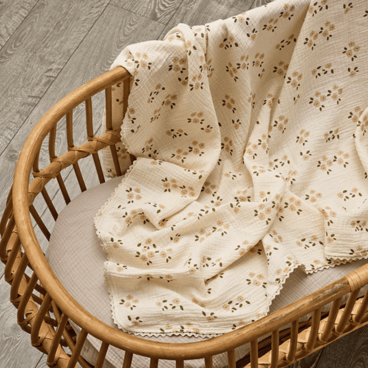 Over-The-Dandelions-Organic-Muslin-Swaddle-Lace-Blanket-Daisy-In-Bassinet-Naked-Baby-Eco-Boutique