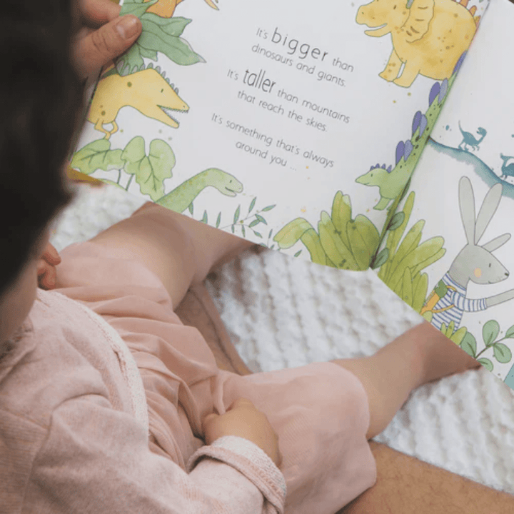 Reading-Together-Olive-And-Page-In-A-World-Full-Of-Magic-Book-Naked-Baby-Eco-Boutique
