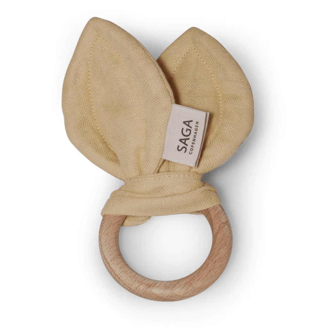 An Saga Copenhagen Organic Cotton + Beechwood Teething Ring with bunny ears, made from Saga Copenhagen.