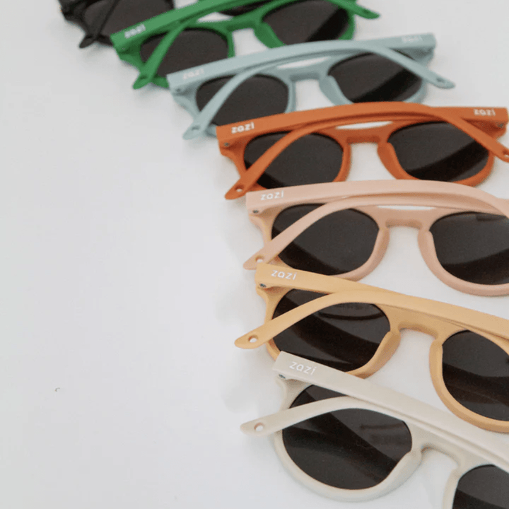 A row of different colored Zazi Shades Baby & Toddler Sunglasses.