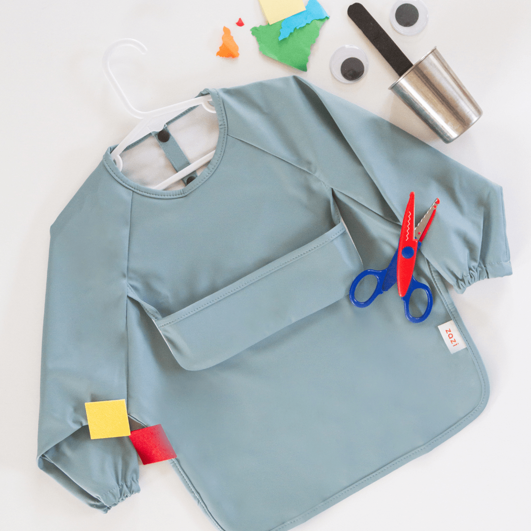 A Zazi Recycled Full-Sleeved Bib (Multiple Variants) with scissors.