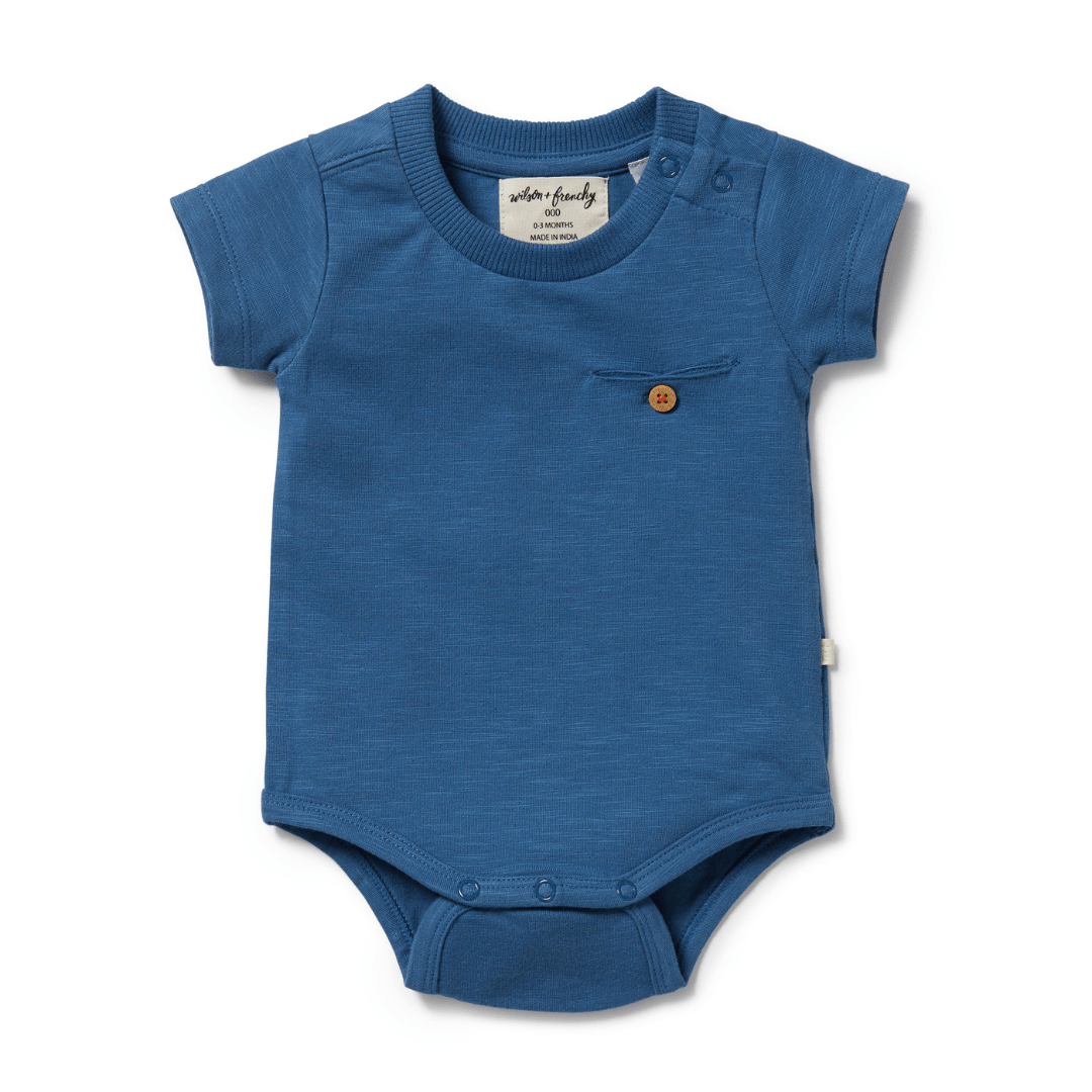 Wilson & Frenchy presents the Wilson & Frenchy Dark Blue Organic Pocket Onesie - LUCKY LAST - 0-3 MONTHS ONLY, a GOTS-certified organic cotton blue baby bodysuit with a pocket on the front.