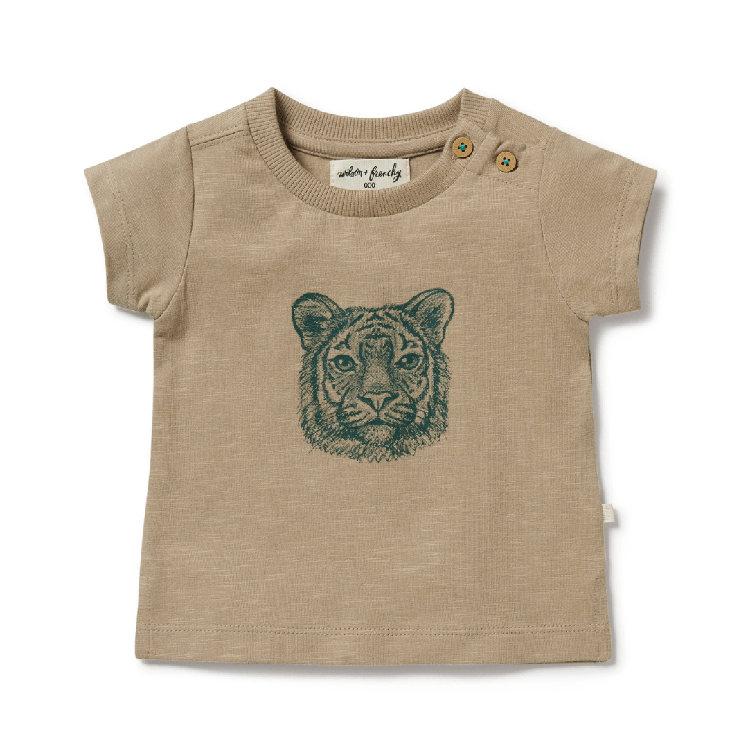 An easy dressing Wilson & Frenchy Leo the Lion Organic Tee with a lion head on organic cotton.