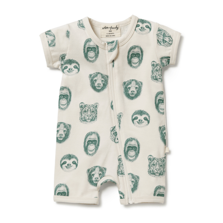 A white and green Wilson & Frenchy Organic Boyleg Zipsuit with faces on it.