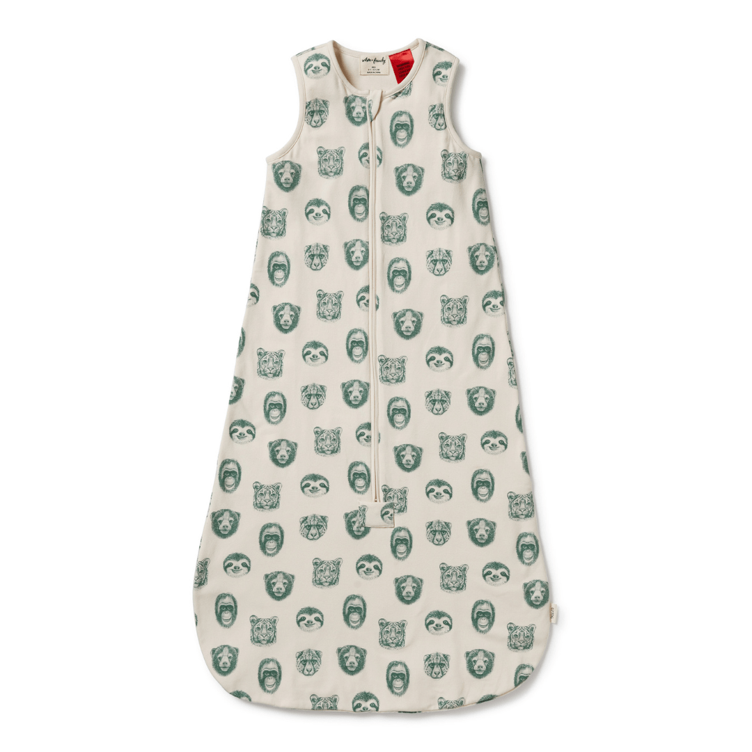 Restful sleep in a Wilson & Frenchy Organic Cotton Summer Sleeping Bag - LUCKY LAST - TROPICAL GARDEN - 6-12 MONTHS ONLY with a bear print.