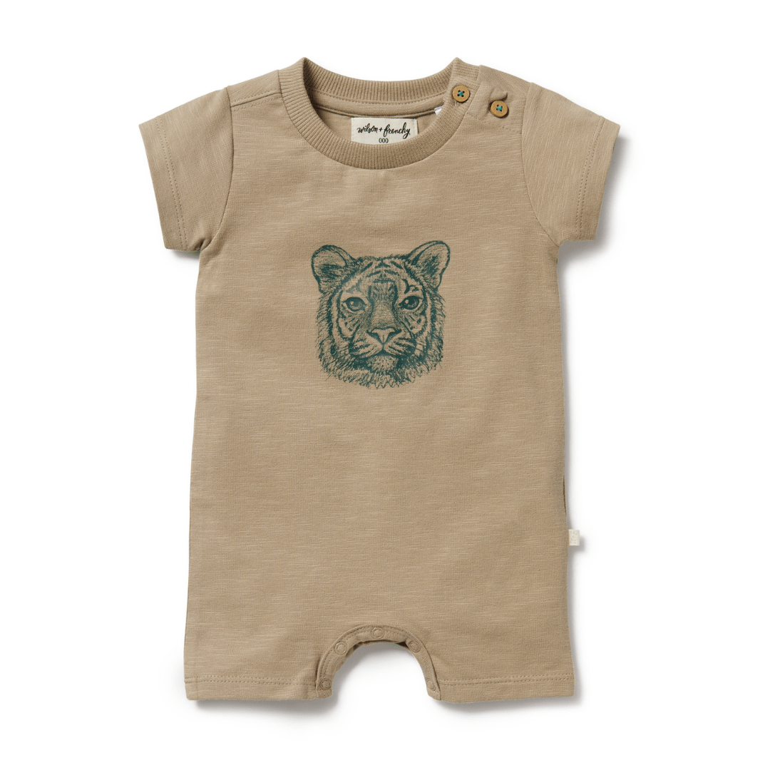 A Wilson & Frenchy Organic Leo the Lion Boyleg Growsuit with a tiger head on it, perfect for your little one's wild adventures.