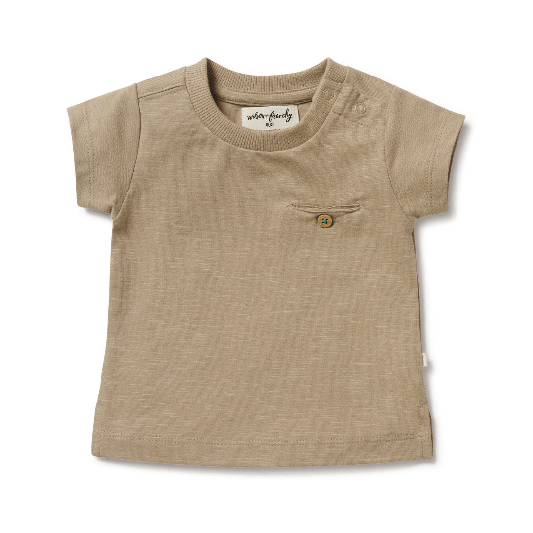 A Wilson & Frenchy Organic Pocket Tee (Multiple Variants) baby and toddler t-shirt with a pocket.